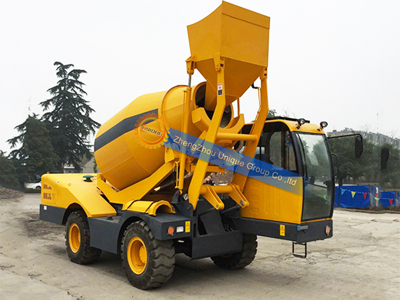 Self loading concrete mixer truck